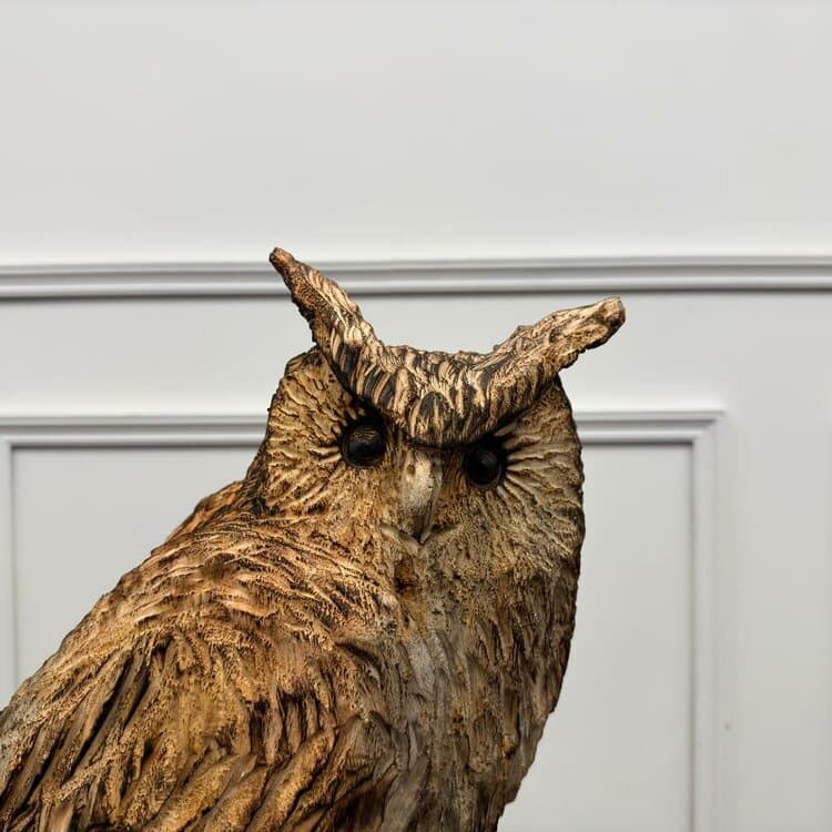 houtsnijwerk van een uil