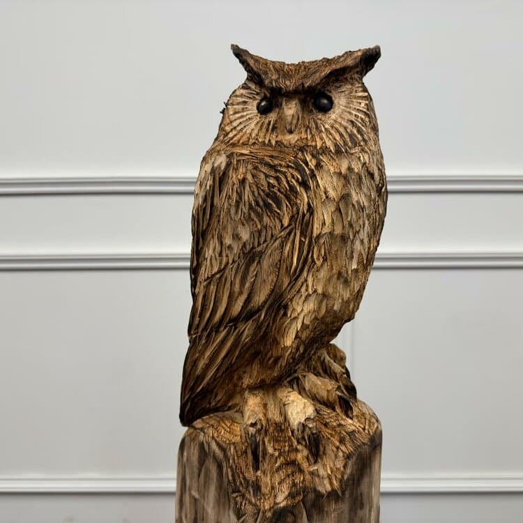 houtsnijwerk van een uil