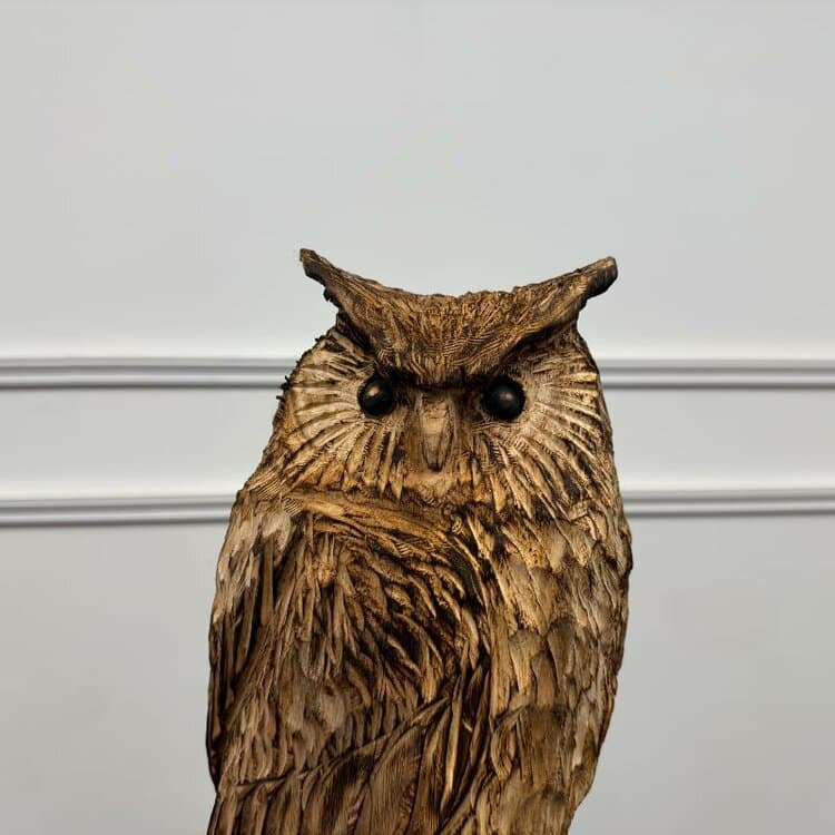 houtsnijwerk van een uil